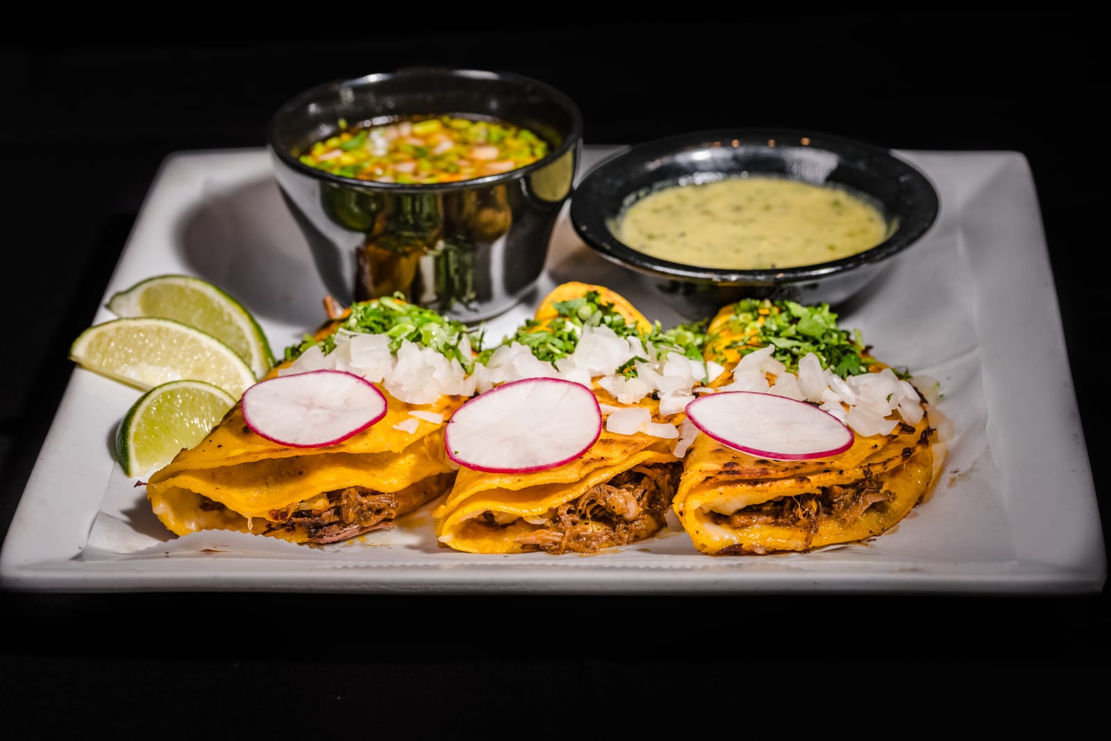Quesabirria tacos with consommé